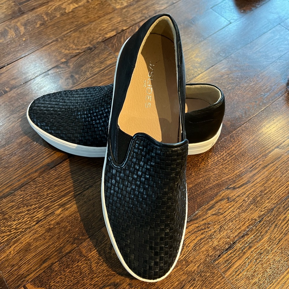 Brand new…never worn. J. Slides
